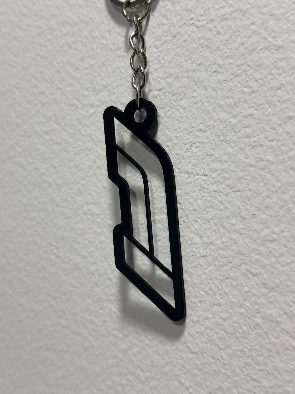 [110]_F1_Keychain_Black