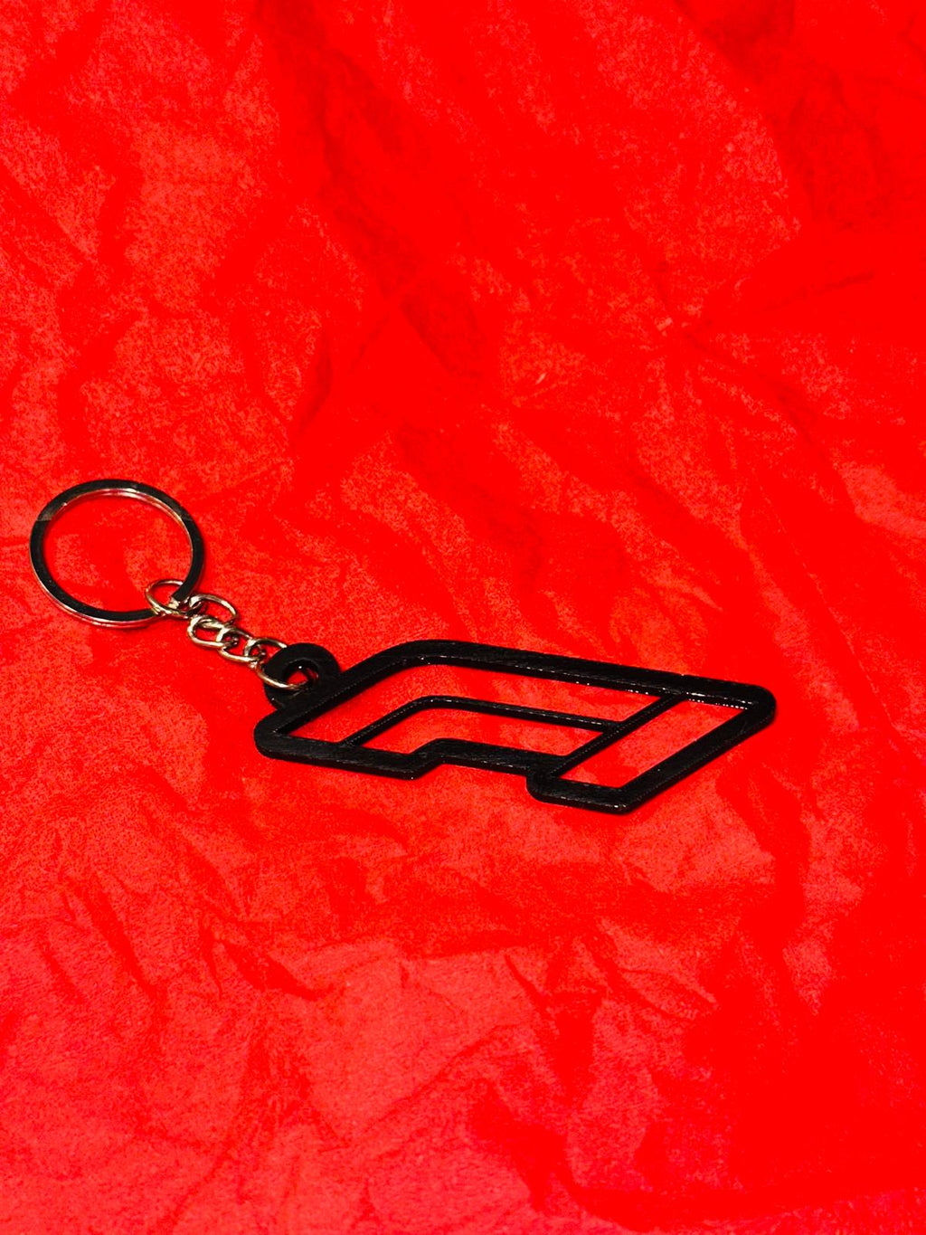 [110]_F1_Keychain_Black