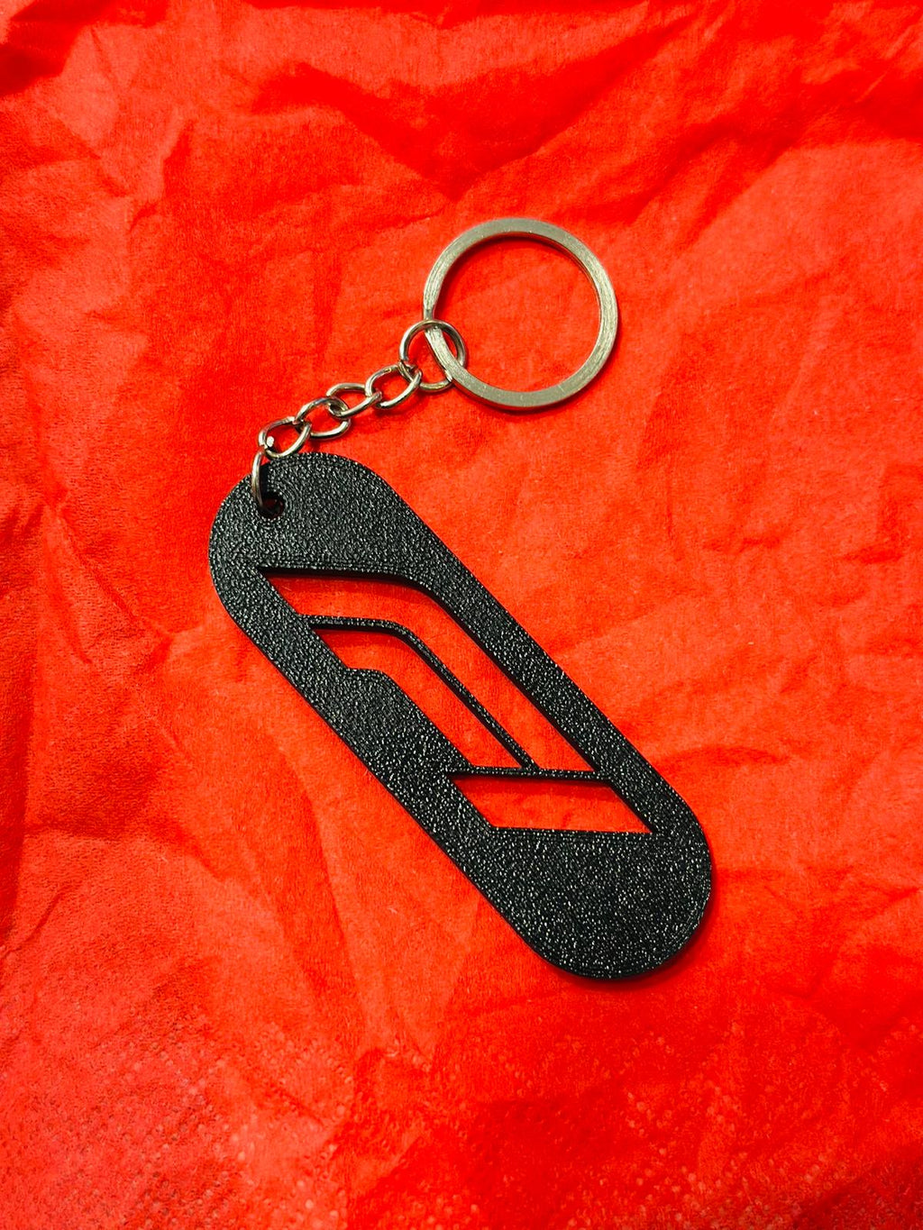 [130]_F1_Keychain_Black
