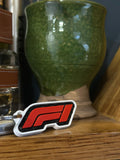 [100]   F1  Keychain